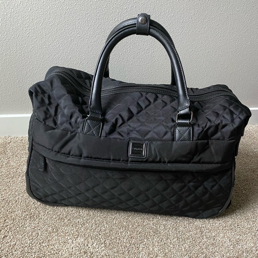 Calvin Klein black quilted roller weekend bag!
